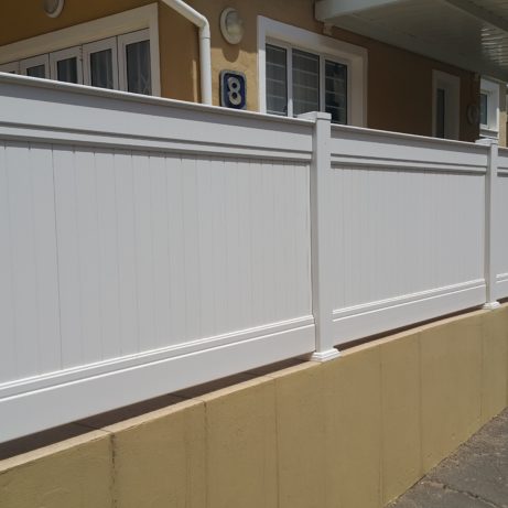 pvc private fence extension on brick wall 9