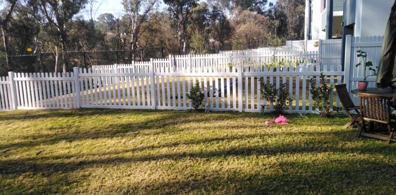 pvc picket fence stepped installation