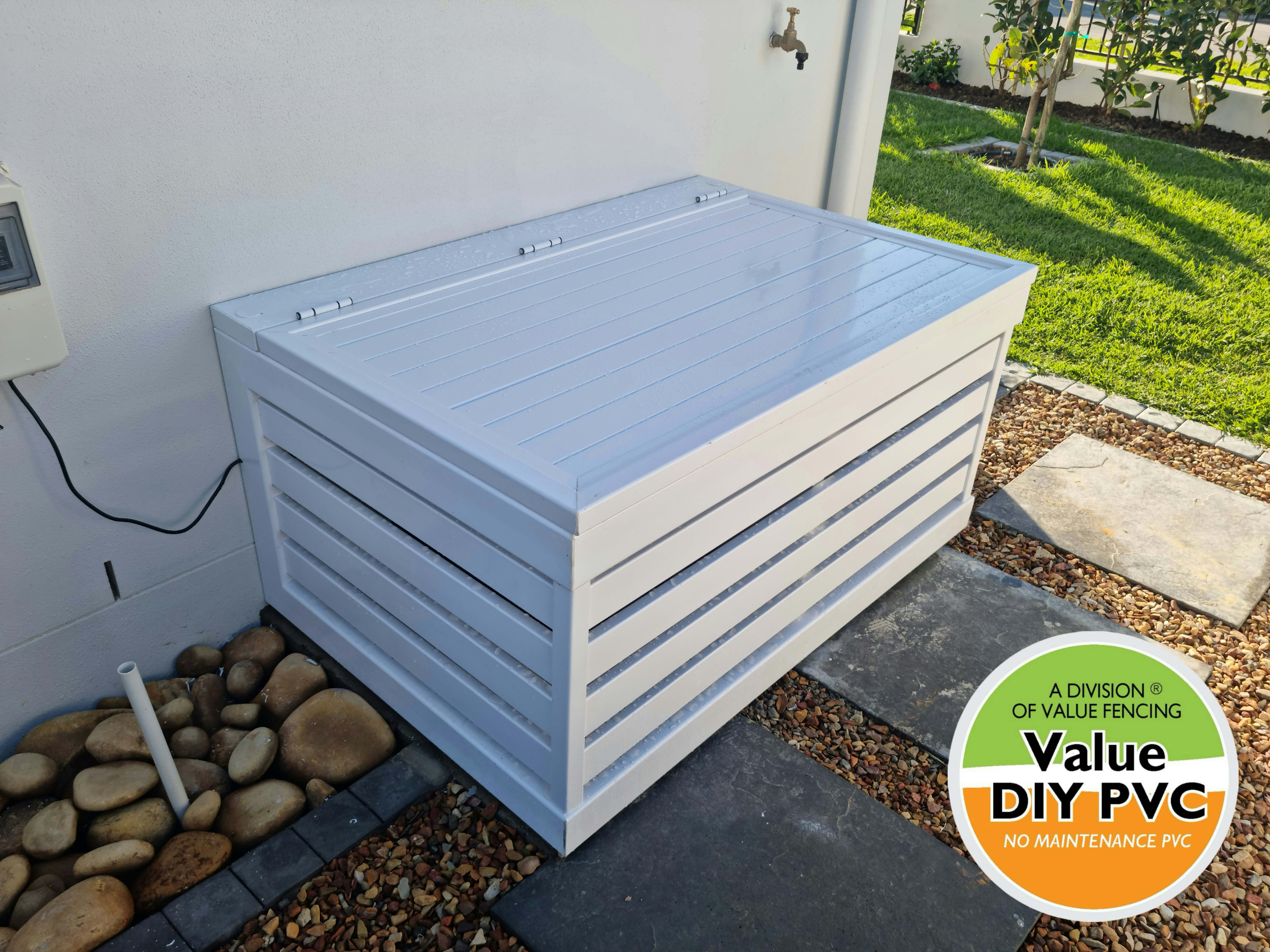 pool filter and pump inside pvc slatted enclosure lid open